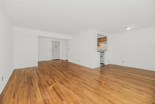 unfurnished living room with light hardwood / wood-style flooring