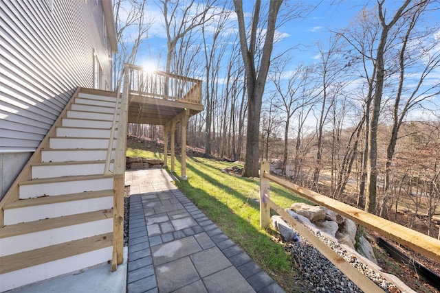 view of yard featuring a wooden deck