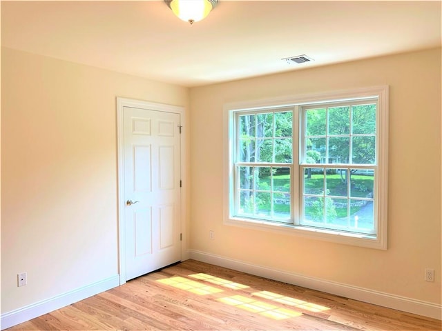 unfurnished bedroom with light hardwood / wood-style floors