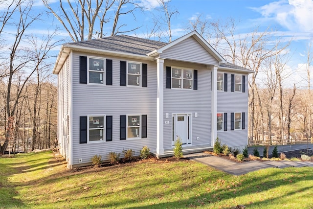 view of front of house with a front lawn