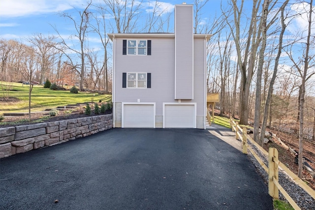 view of home's exterior with a garage