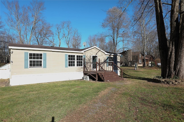 view of front facade with a front lawn