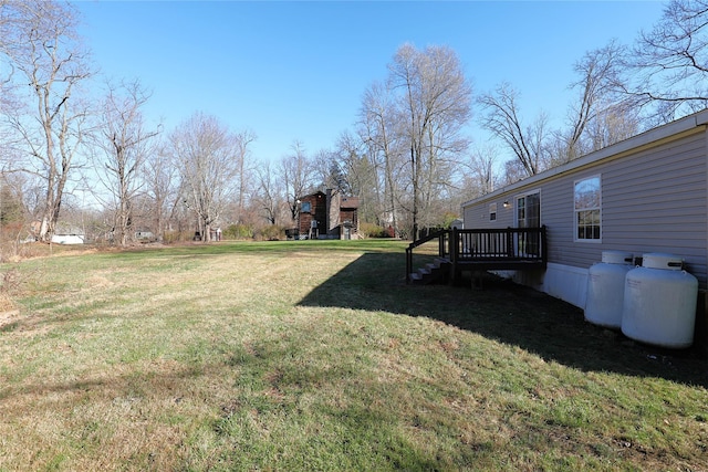 view of yard featuring a deck