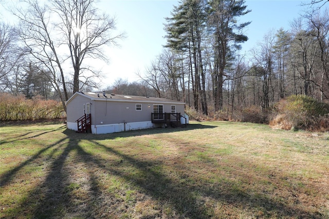 view of yard featuring a deck