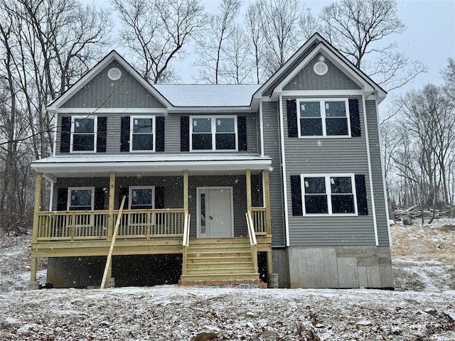 view of front of property featuring covered porch