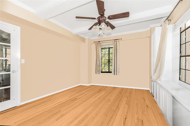 empty room with beam ceiling, light wood-type flooring, ceiling fan, and ornamental molding