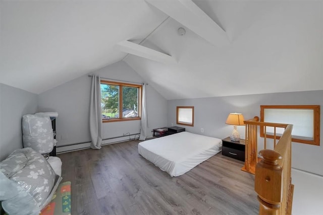 bedroom with lofted ceiling with beams, hardwood / wood-style flooring, and a baseboard heating unit