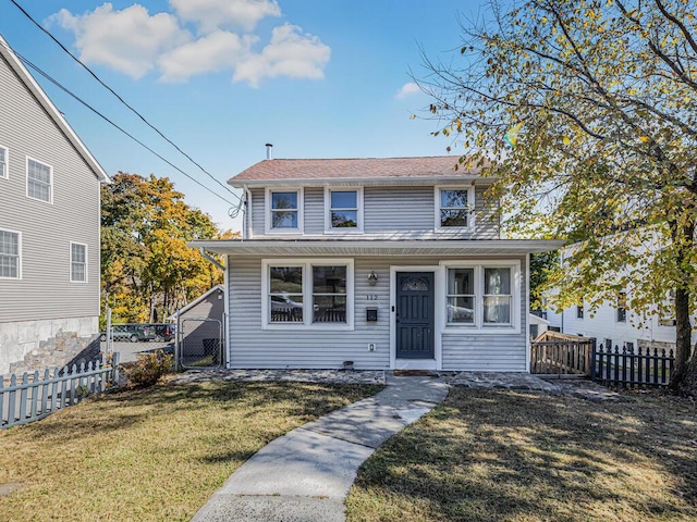 view of front facade with a front yard