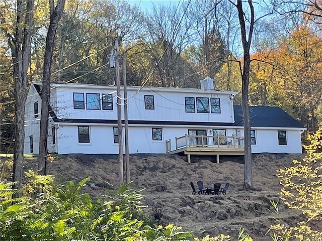 rear view of property with a deck