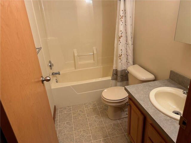 full bathroom with tile patterned flooring, vanity, toilet, and shower / bathtub combination with curtain