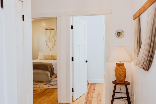 hallway featuring light hardwood / wood-style flooring