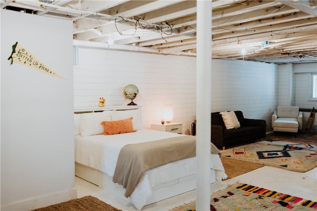 bedroom with concrete flooring