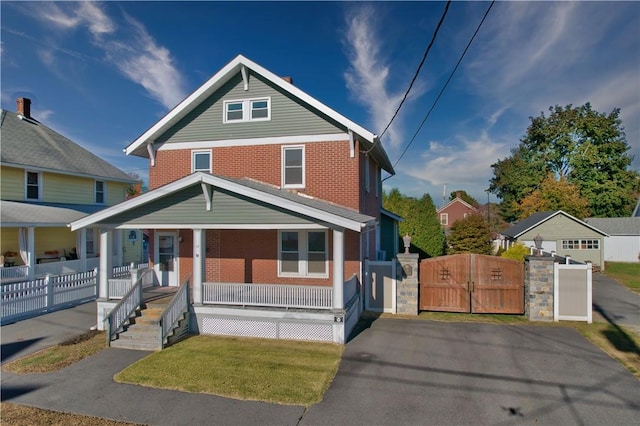 view of front of property featuring covered porch