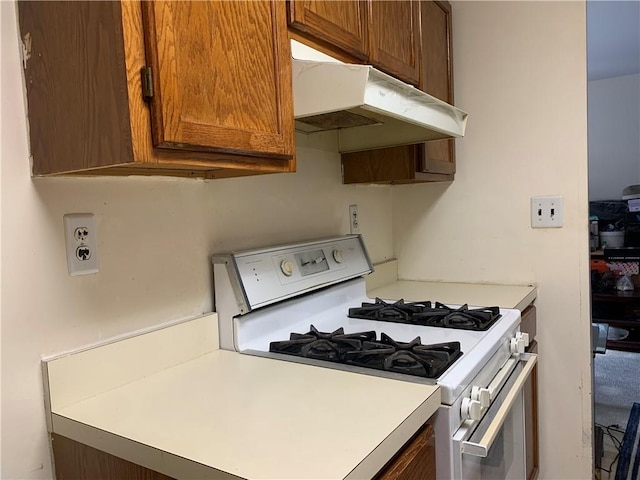 kitchen featuring white gas range oven