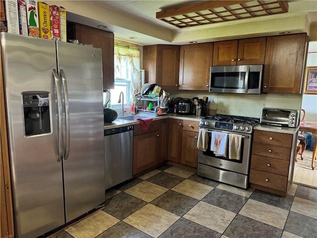 kitchen featuring sink and stainless steel appliances