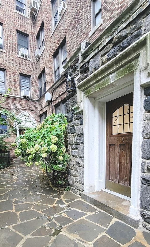 entrance to property with cooling unit