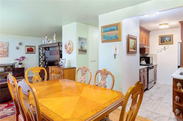 3333 Henry Hudson Pkwy Unit 1G, Bronx, NY 10463 - dining room featuring light marble finish floors