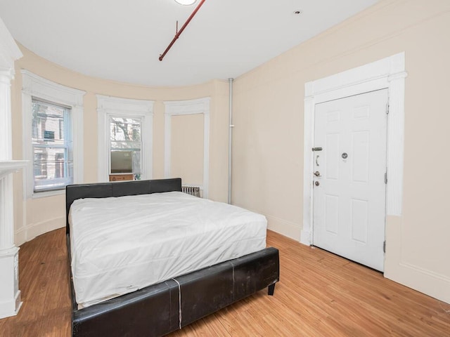 bedroom featuring hardwood / wood-style flooring