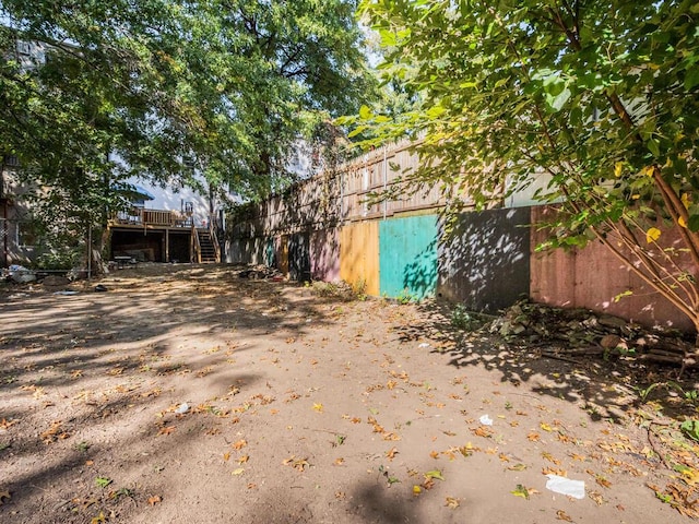 view of yard featuring a deck