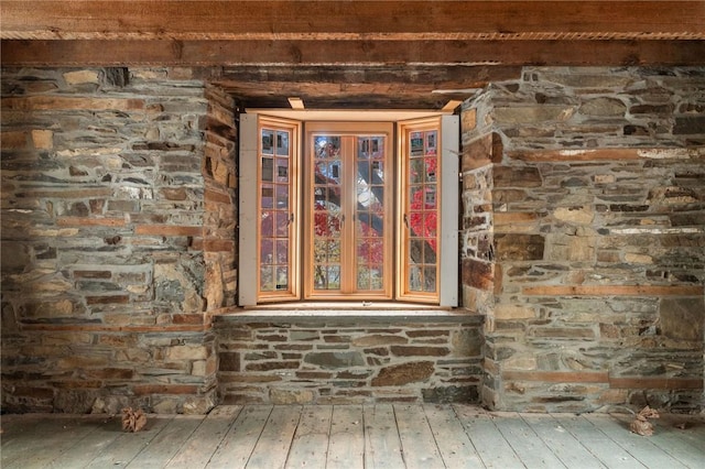 room details with beam ceiling and wood-type flooring