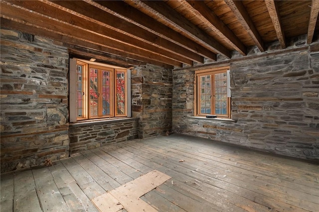 miscellaneous room with beamed ceiling, wooden ceiling, and hardwood / wood-style flooring