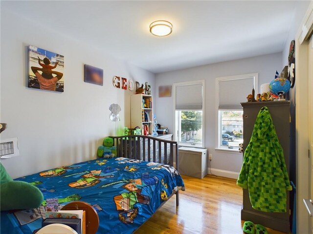 bedroom featuring light hardwood / wood-style flooring