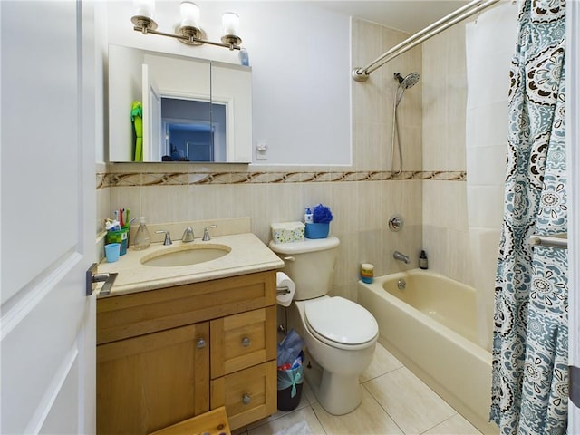 full bathroom featuring vanity, tile patterned floors, toilet, tile walls, and shower / tub combo with curtain