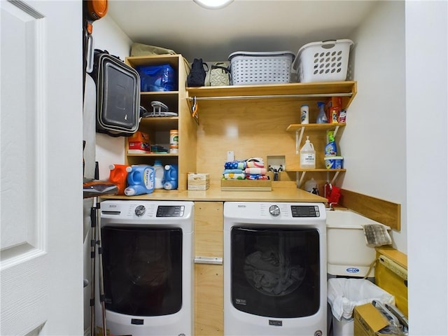 laundry room with washer and clothes dryer