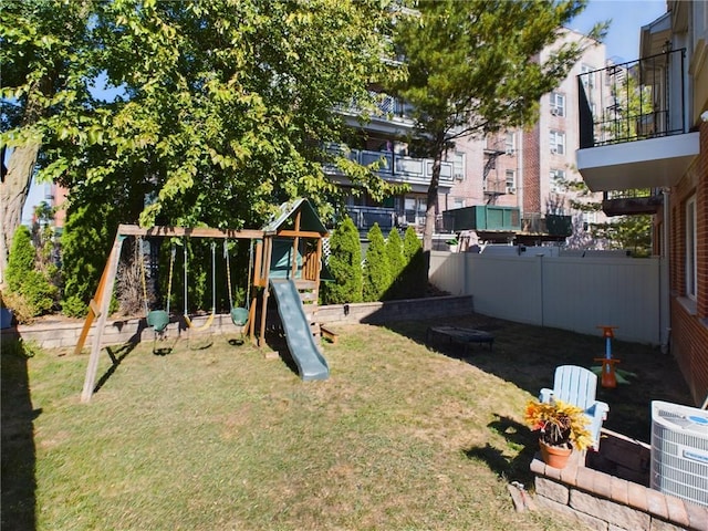 view of yard with a playground and cooling unit