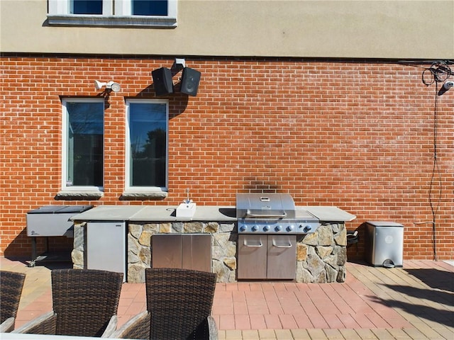 view of patio with area for grilling