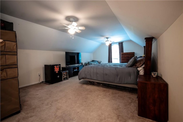 bedroom with carpet flooring, ceiling fan, and lofted ceiling