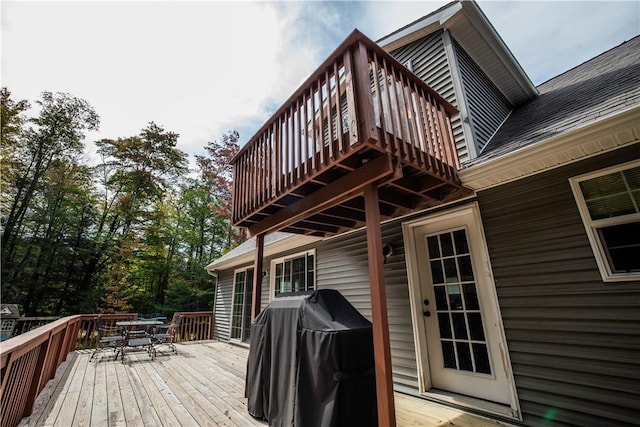 wooden terrace with grilling area