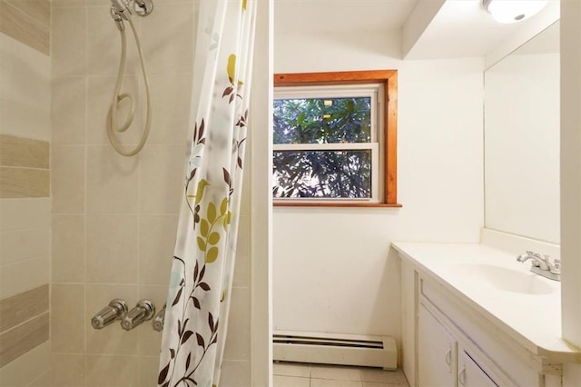 bathroom featuring tile patterned floors, curtained shower, vanity, and a baseboard heating unit