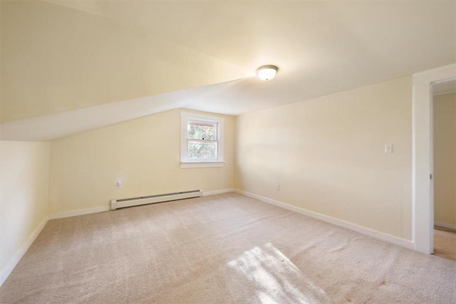 bonus room featuring carpet, lofted ceiling, and a baseboard heating unit