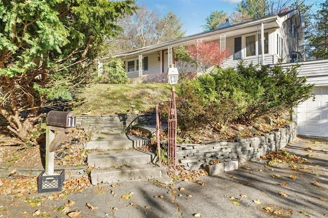 single story home with a garage