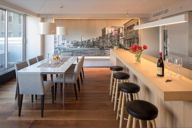 dining room featuring dark hardwood / wood-style floors