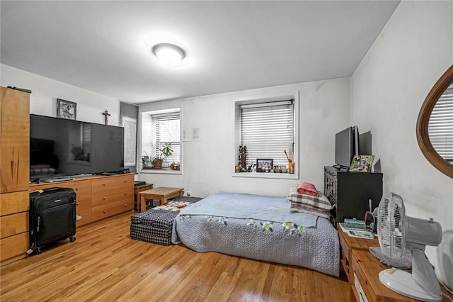 bedroom featuring hardwood / wood-style flooring