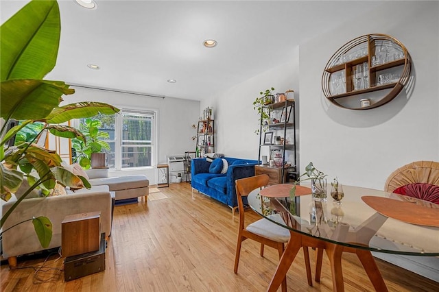 living room with light hardwood / wood-style flooring