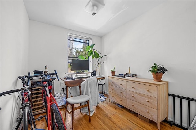 office space with light hardwood / wood-style floors