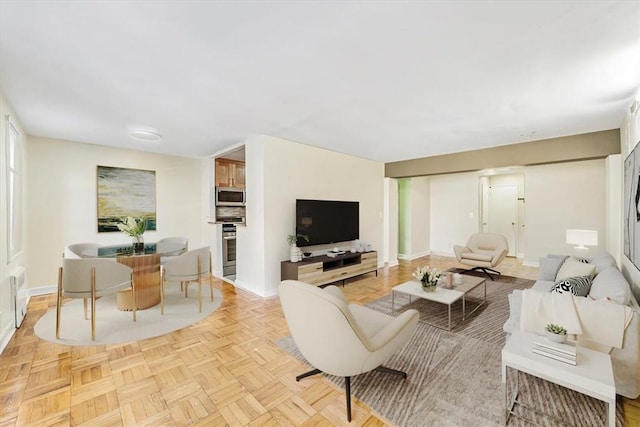 living room featuring light parquet floors