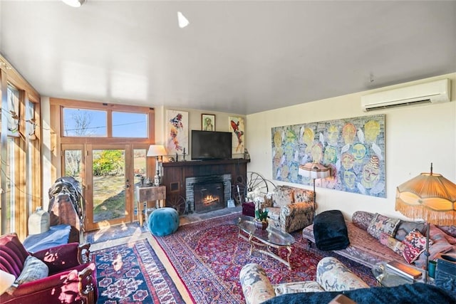 living room with a wall mounted air conditioner and a fireplace