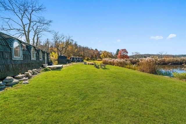 view of yard with a water view