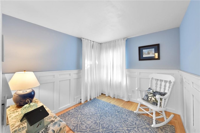 living area with light hardwood / wood-style floors