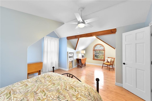 bedroom featuring ceiling fan, lofted ceiling with beams, and light wood-type flooring