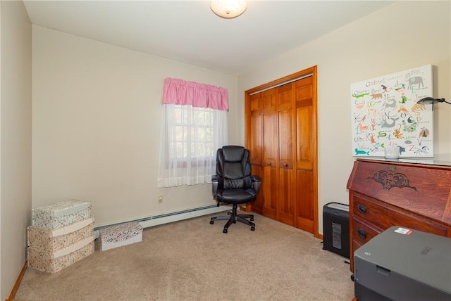 office area with baseboard heating and light colored carpet