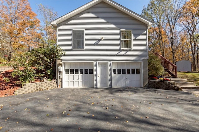 view of property exterior featuring a garage