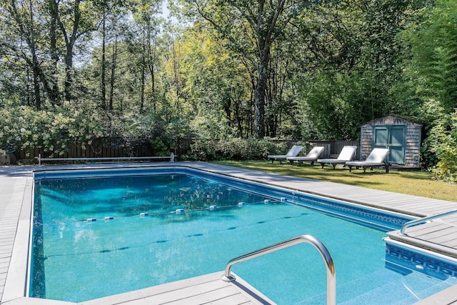 view of pool featuring a storage unit