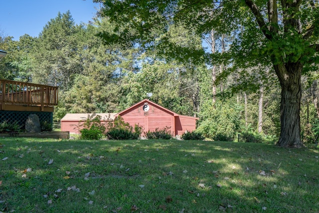 view of yard with a wooden deck