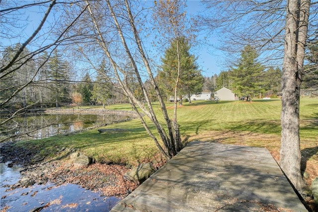 view of yard featuring a water view