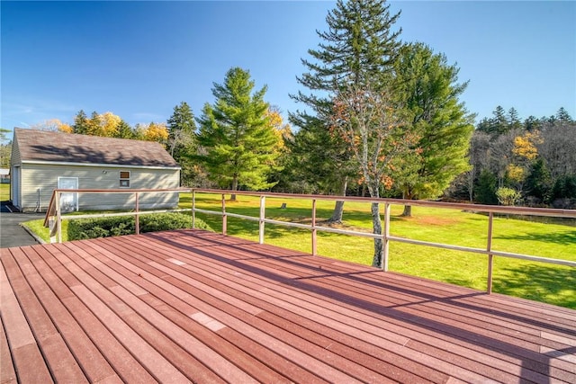 wooden terrace with a lawn